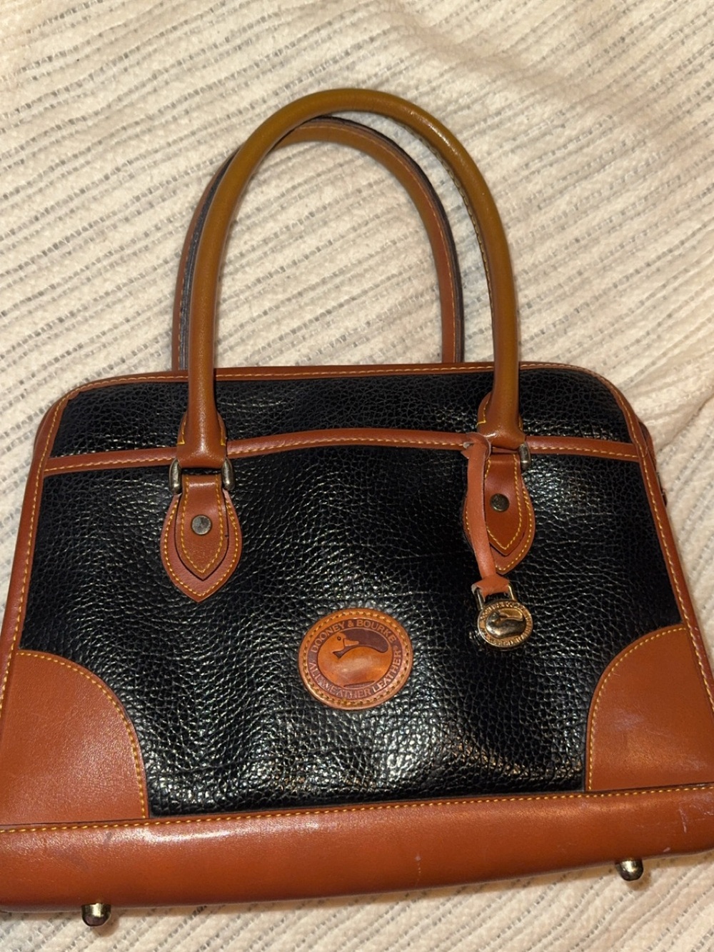 Dooney & Bourke Black with Brown Trim Pebbled Leather Satchel